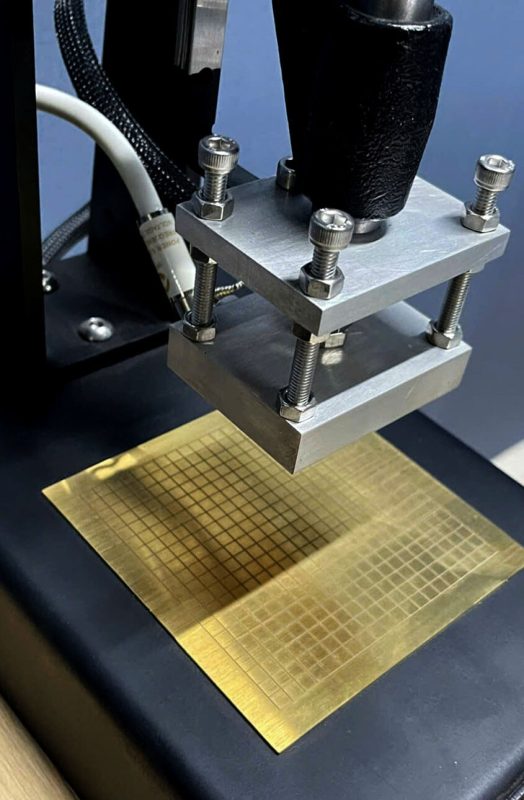 may ep nhiet logo len bia so 01