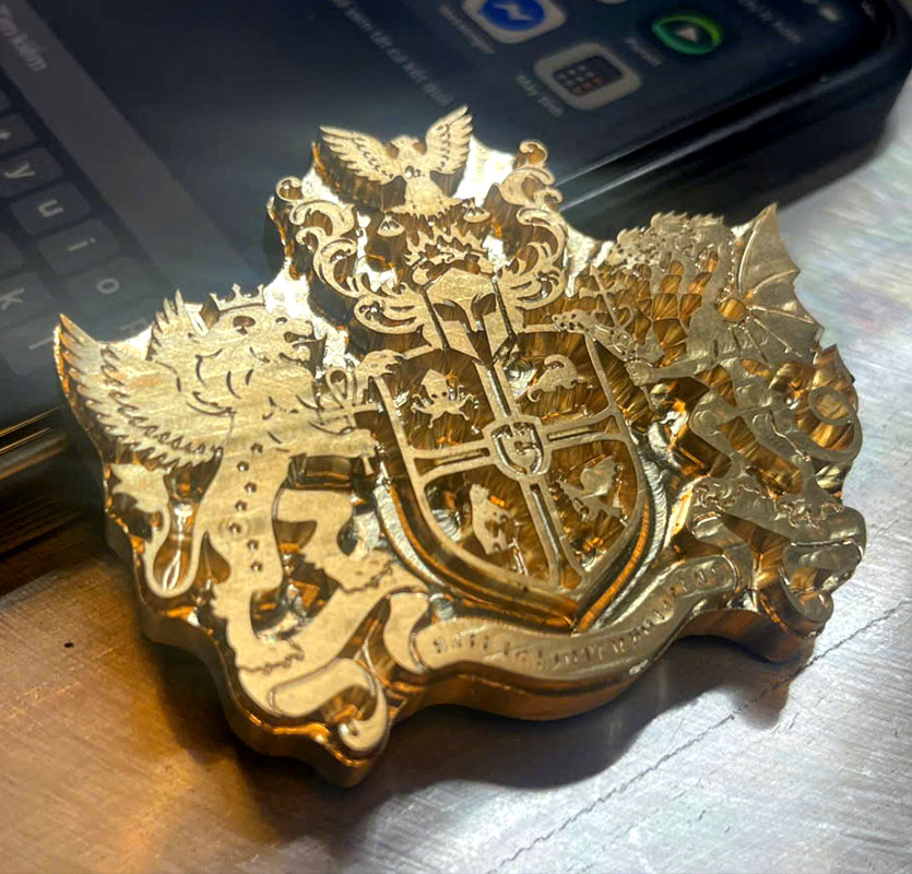 Logo đồng in ví da